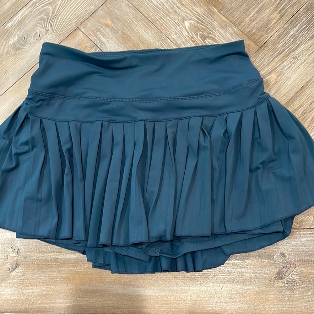 Pleated teal tennis skirt